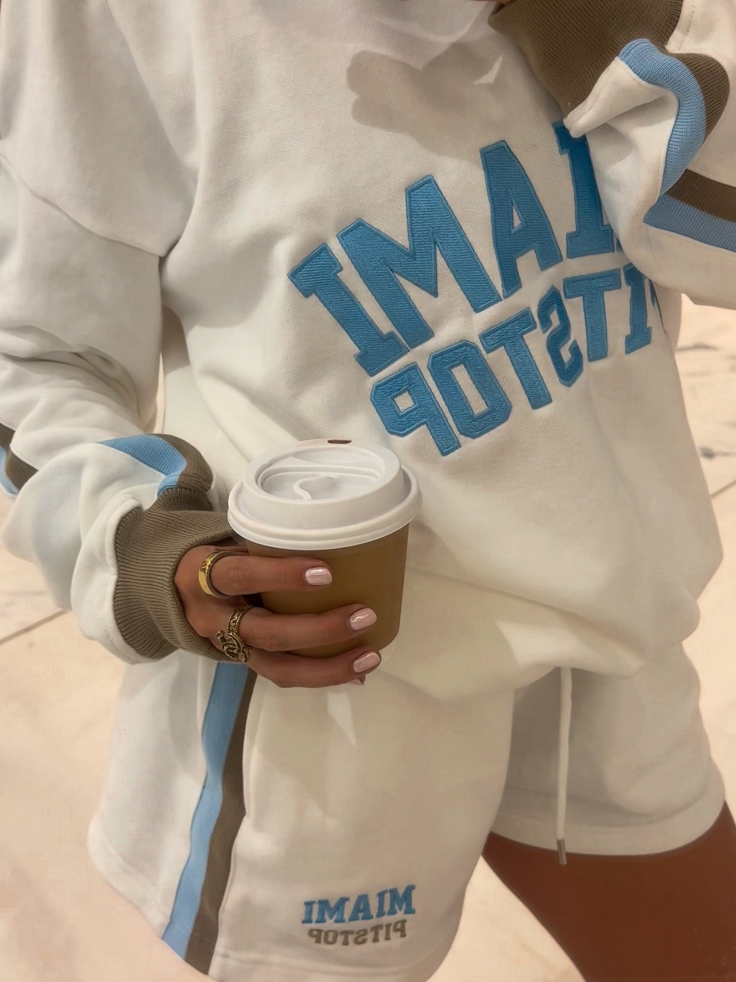 White Jumper Blue & Brown Stripe